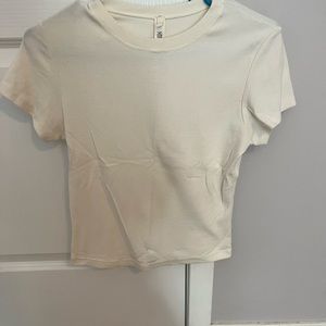 Barely worn cream color skims pointelle baby t shirt